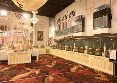 Elegant banquet buffet setup with luxury décor, chandelier lighting, and premium dining arrangement at Clarion Inn Amps Patiala